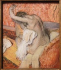 Après le bain, femme se séchant. Edgar Degas.
