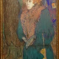 Jane Avril à l'entrée du Moulin-Rouge. Toulouse-Lautrec.